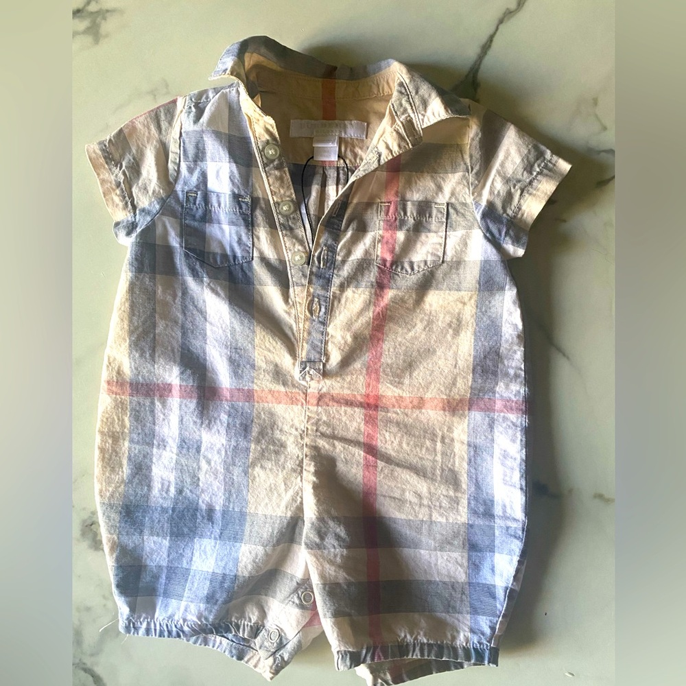 Authentic Baby Burberry onesie clean and only worn indoors.